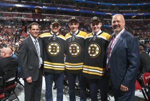 SUNRISE, FL - JUNE 26: (L-R) General Manager Don Sweeney, Jakub Zboril, 13th overall pick, Zachary Senyshyn, 15th overall pick, Jake DeBrusk, 14th overall pick, and head coach Claude Julien of the Boston Bruins pose for a group photo on the draft floor during Round One of the 2015 NHL Draft at BB&T Center on June 26, 2015 in Sunrise, Florida. (Photo by Dave Sandford/NHLI via Getty Images)